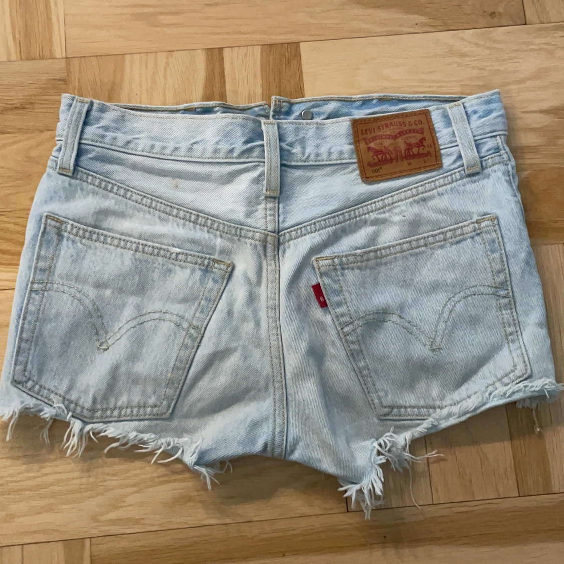 Ljusblåa Levi’s shorts  - 90