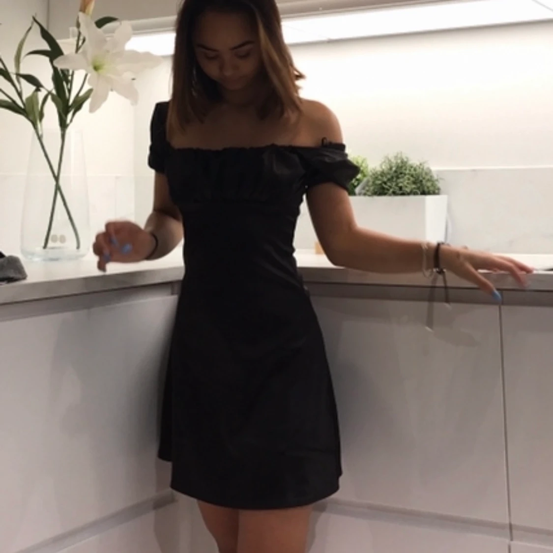 Svart silkesklänning