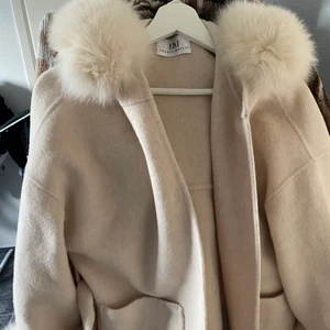 Jacket from Dennis Maglic - Wear it twice. I cut the jacket because the length was too long for me (please check 3rd photo) send me a message if you want more pictures. 