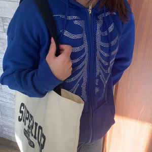 Rhinestone - Min rhinestone hoodie, jag köpte den på plick men den var för liten för mig så jag ska nu sälja den. Den är i storlek M (varning armarna är för korta när det gäller killar)