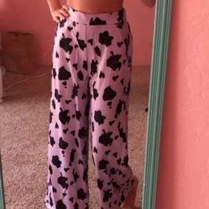  pants made of pink leopard print, in perfect condition, worn only 5 times