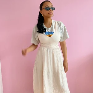 Flowy light dress  - Light pink dress with open back. Good for for layering or maybe as a beach cover up.