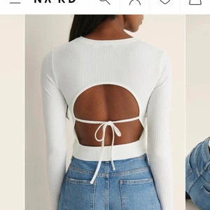 Nakd croptop - Öppen rygg crop top från nakd. Helt oanvänd så den är helt ny. St 36
