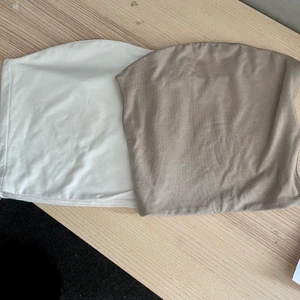 2st tube topp i xs - 2st tube tops från bik bok, beige och vit, i storlek xs men de är väldigt stretchiga:) (frakt 66kr)