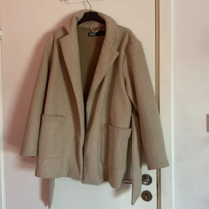 Kappa  - En kappa från Zara som inte kommer till användning 