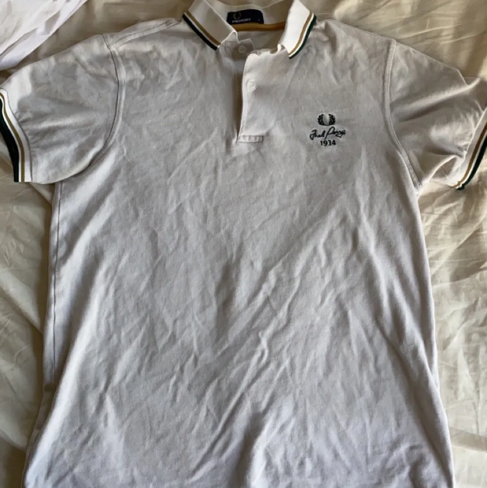 Fred Perry piké i storlek s. T-shirts.