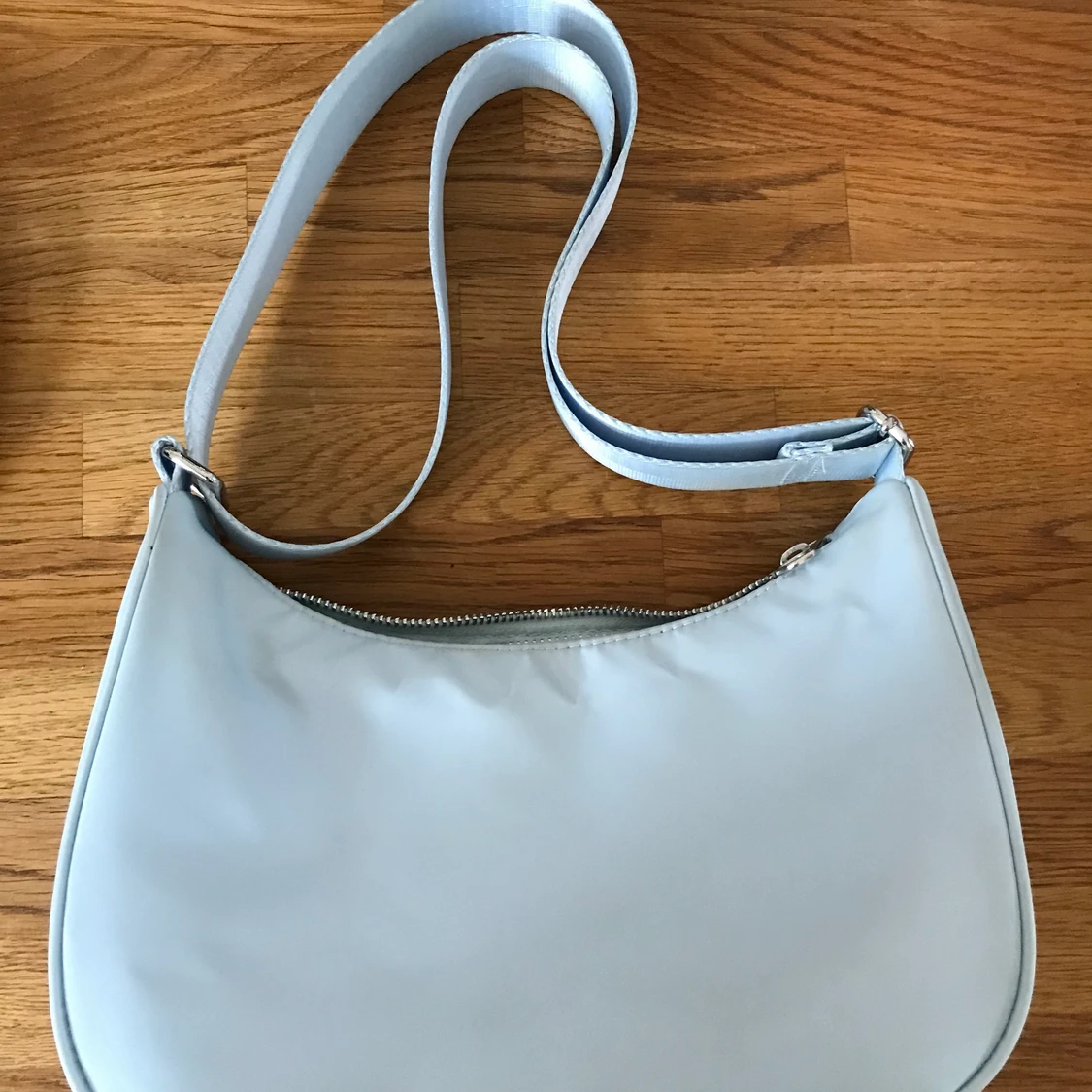 Justerbar axelremsväska 