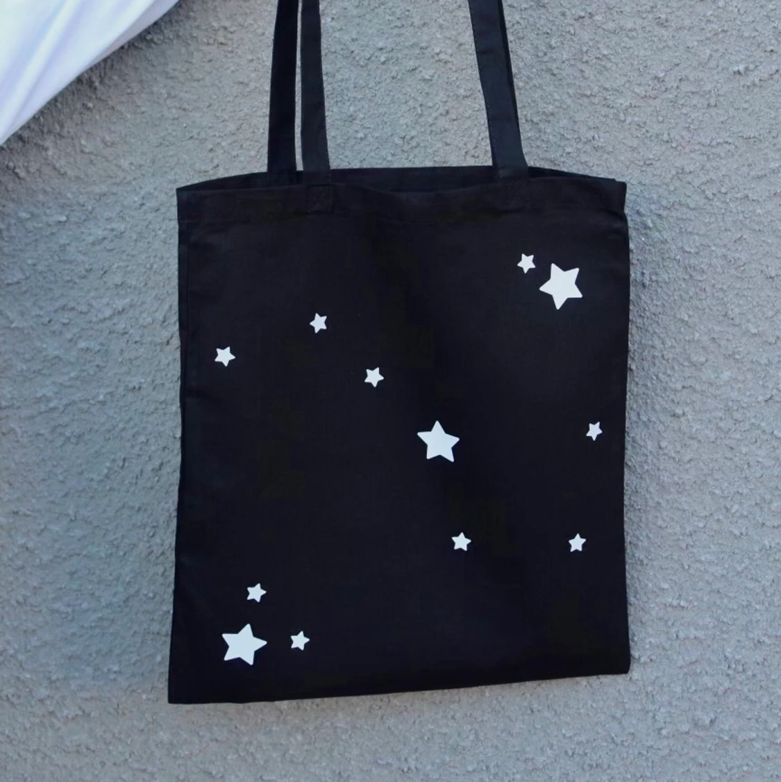 TYGKASSE MED STJÄRNTECKEN - 90