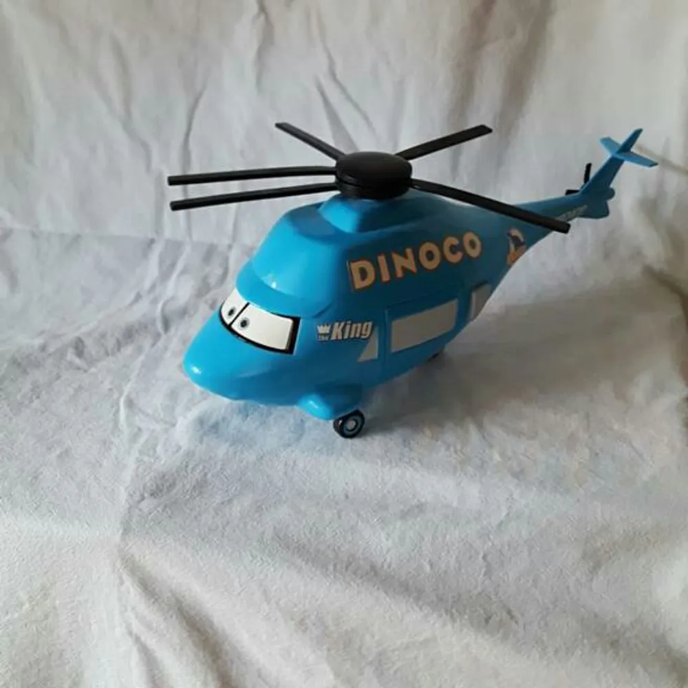 Dinoco helikoptern från Bilar, ca 3dm lång - 1.5dm hög. Övrigt.
