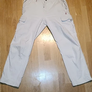 Super fresh white jeans with zippers - They're very movable, the material ceeps the cold out, and the cooler gets people to notice you easier, great to have at parties, interviews and weddings, the pockets are good zippers, two at the front, and one in the back, very shiny covered by a flap. You look freshened than a MF in these no joke!