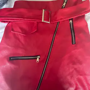 Red fake leather, never worn