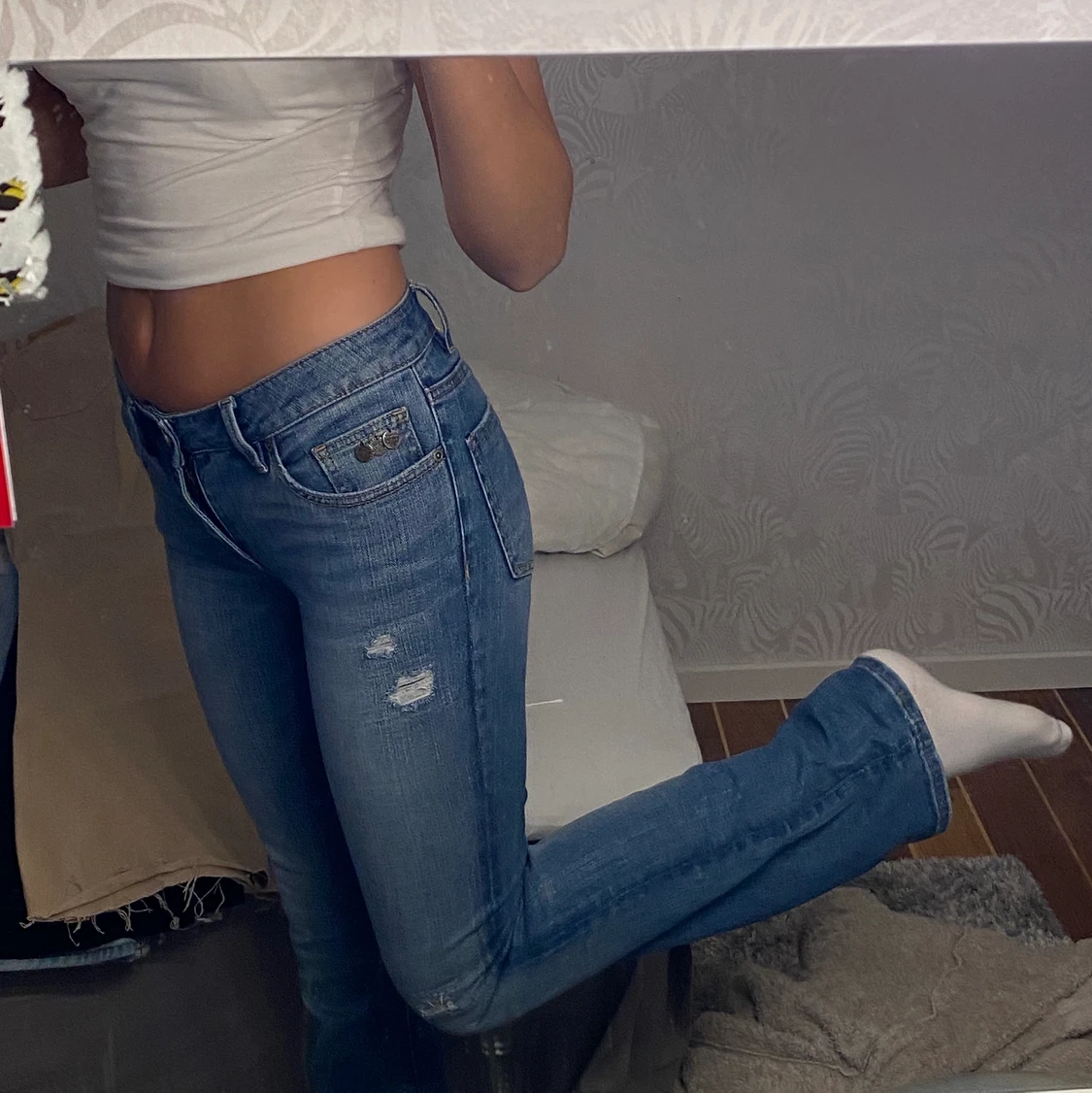 Lågmidjade utsvängda jeans - 90