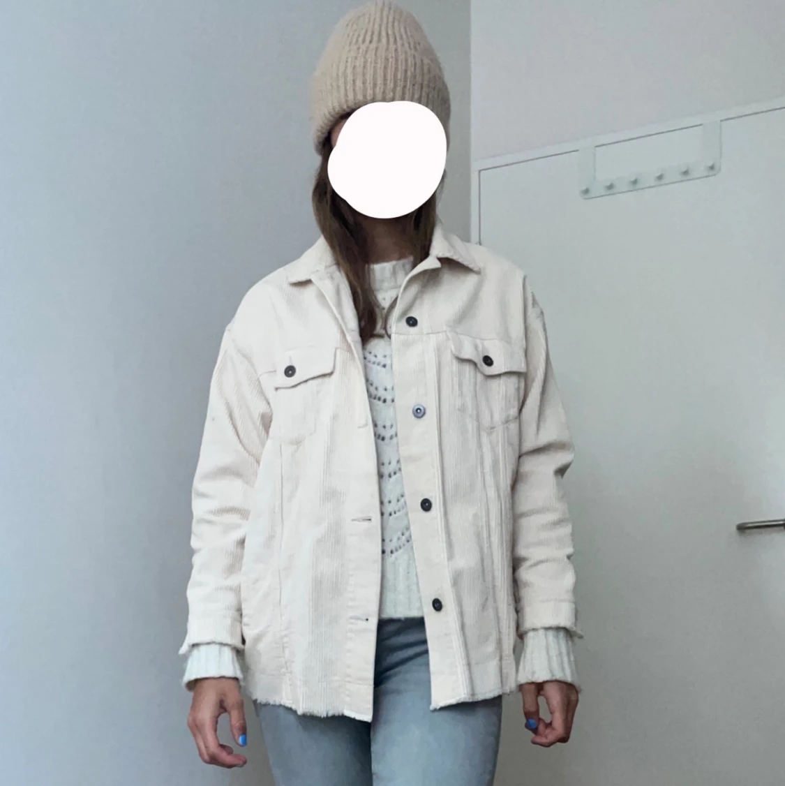 Beige jacka i manchester.