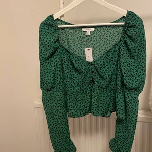 Topp - Helt ny med prislappen kvar ! 