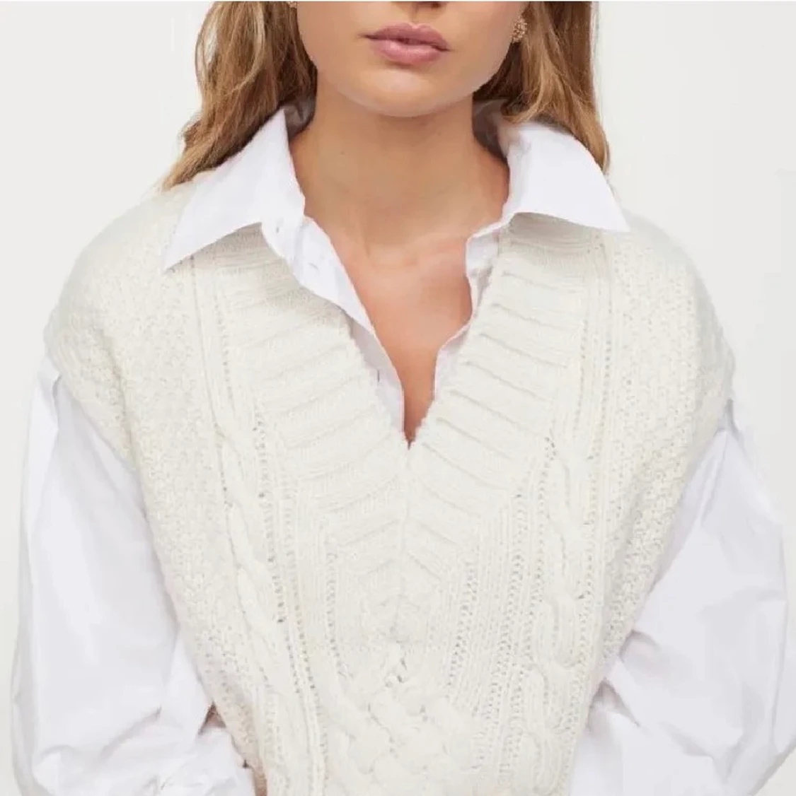 Slutsåld stickad väst från HM