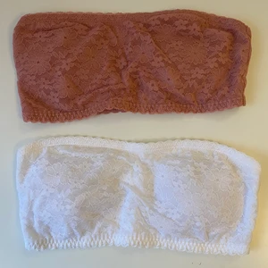 Toppar - ❗️Den vita är såld❗️Säljer dessa två söta bh:ar/toppar. Den vita är aldrig använd men lappen är borttagen. Den rosa är använd en gång. Stl 36, men dom är mycket små för att vara 36. Jag har vanligtvis 36 på tröjor och 75C i bh:ar och jag får knappt på mig dom. Tror den skulle passa någon med stl 32 eller 34.  40kr, frakten ingår i priset!