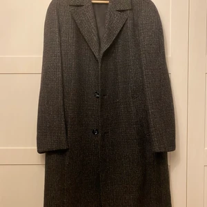 Rock  - Svartgrå rock i strl 52/54. Mycket bra skick. 