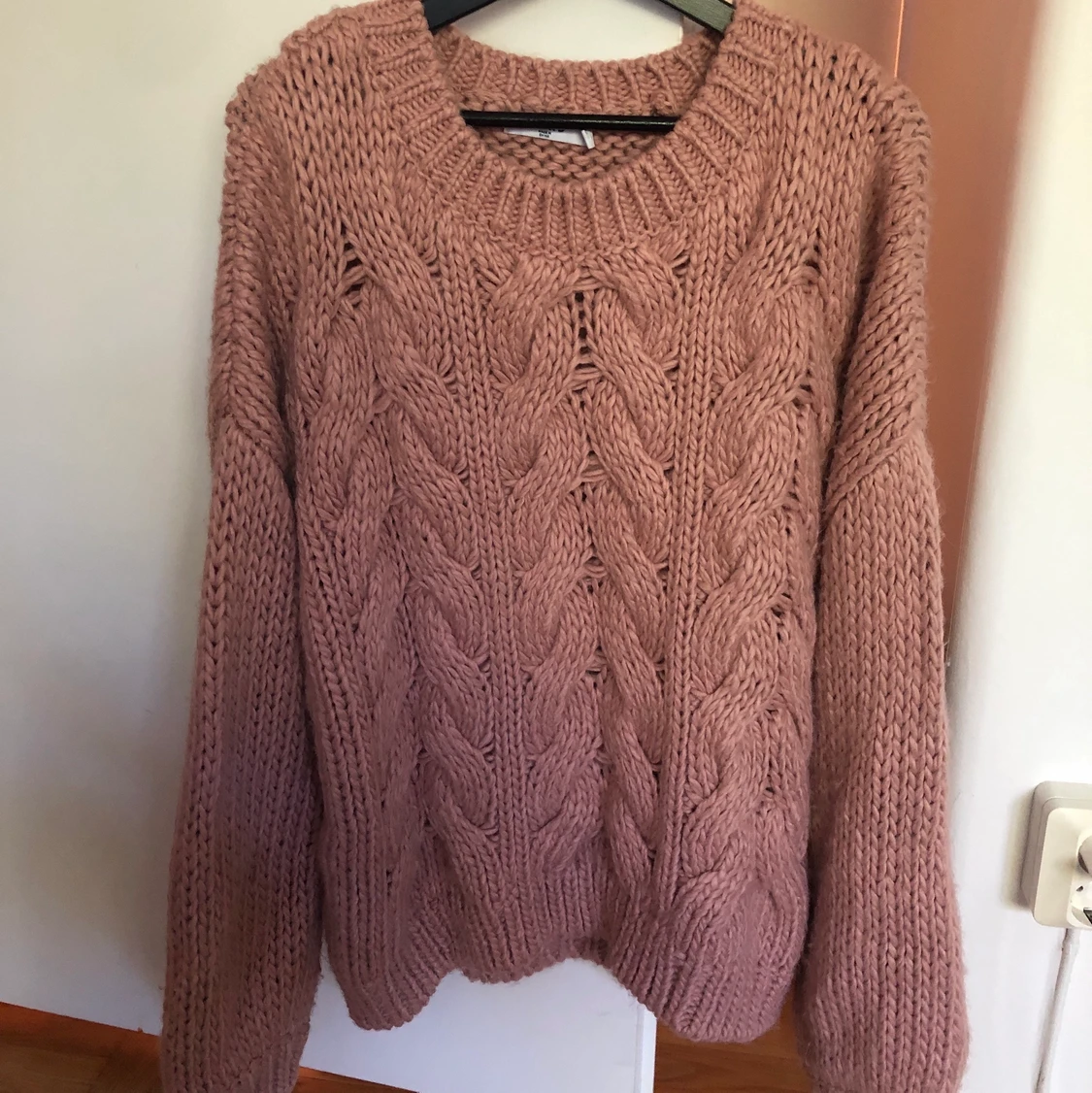 Gammelrosa stickad tröja