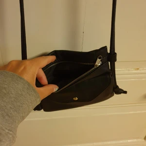 Väska - Svart snygg och smidig väska 