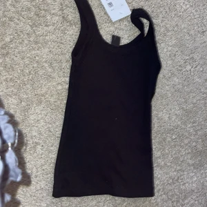  Svart linneoanvänt kommer ifrån stadium -  Jag hatar det