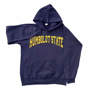 Humbolt State Collage Hoodie - Humbolt hoodie med gult tryck. Skicket är 7/10