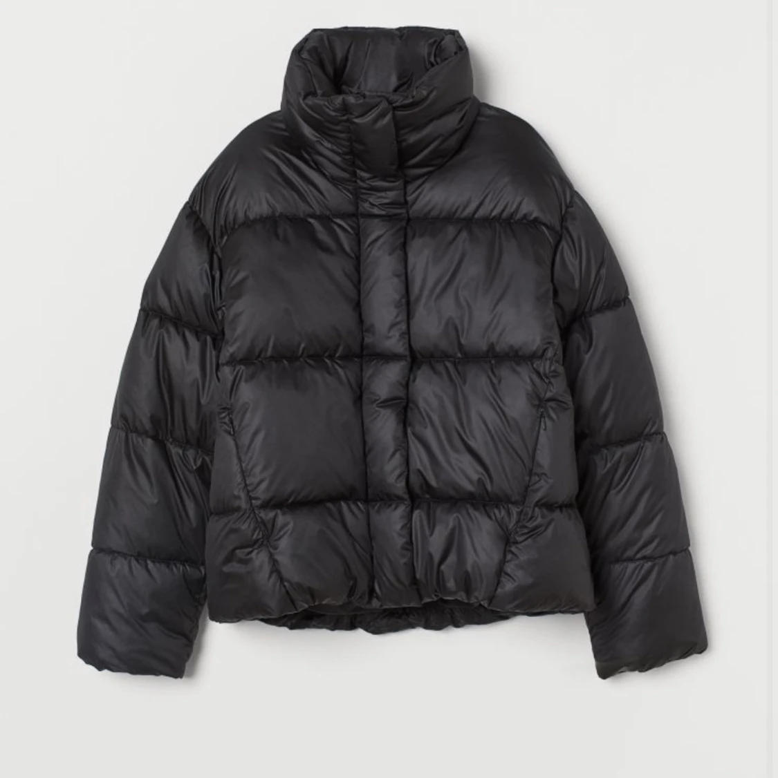 Svart puffer jacket