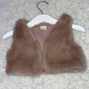 Väst  - Barn väst strl 74