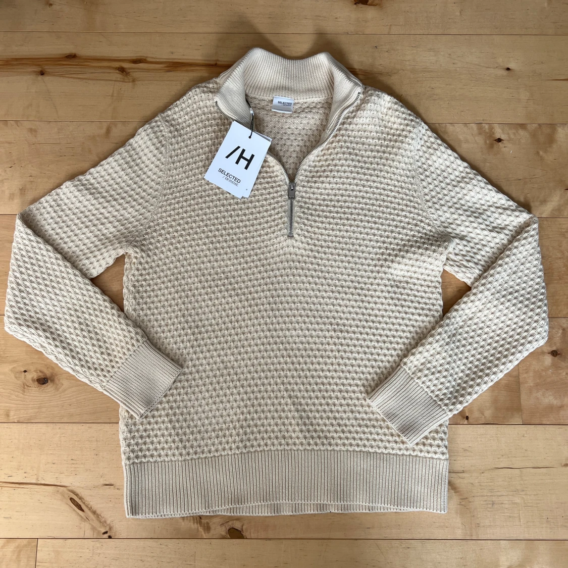 Beige stickad halvzip