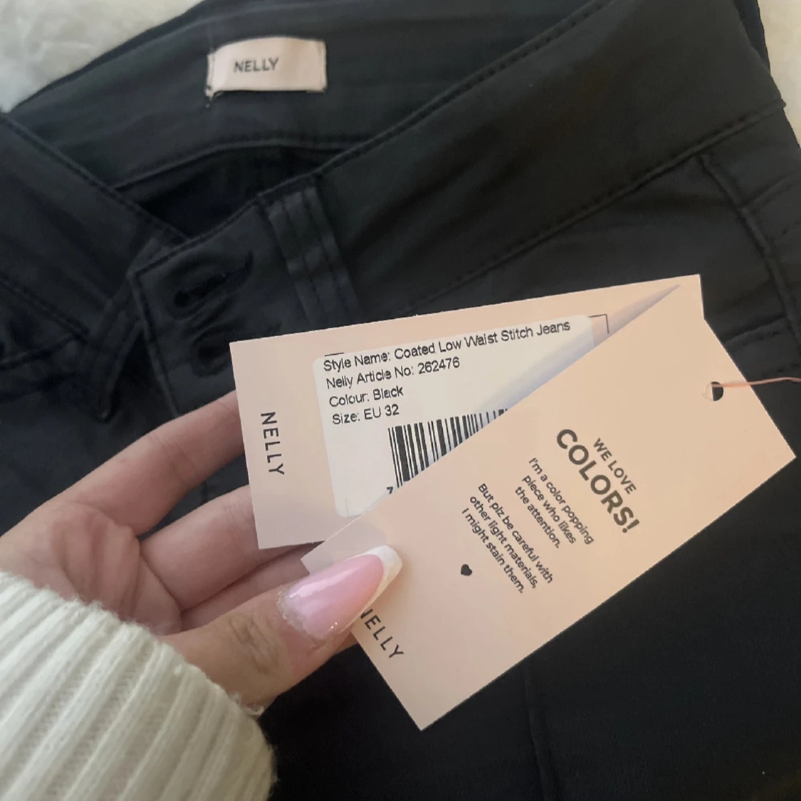 Svarta bootcut byxor i syntet - 2