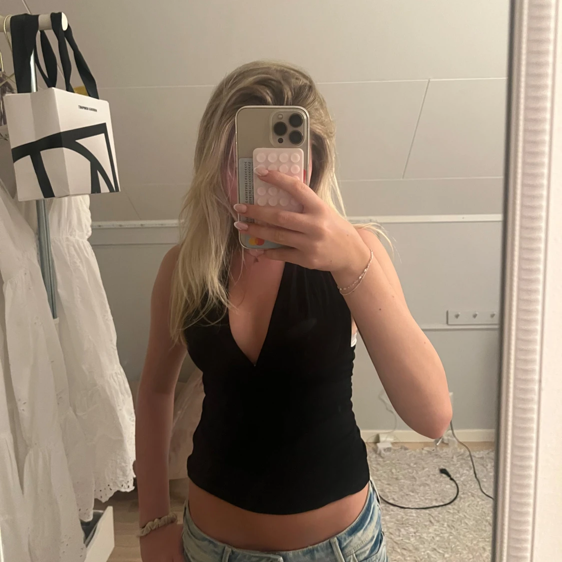 Svart halterneck topp med knyt