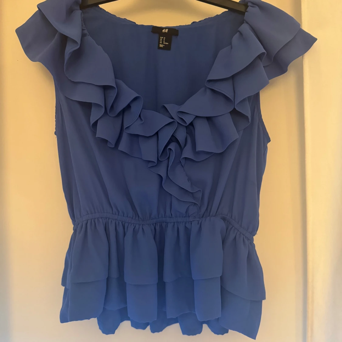 Blå volangtopp från H&M