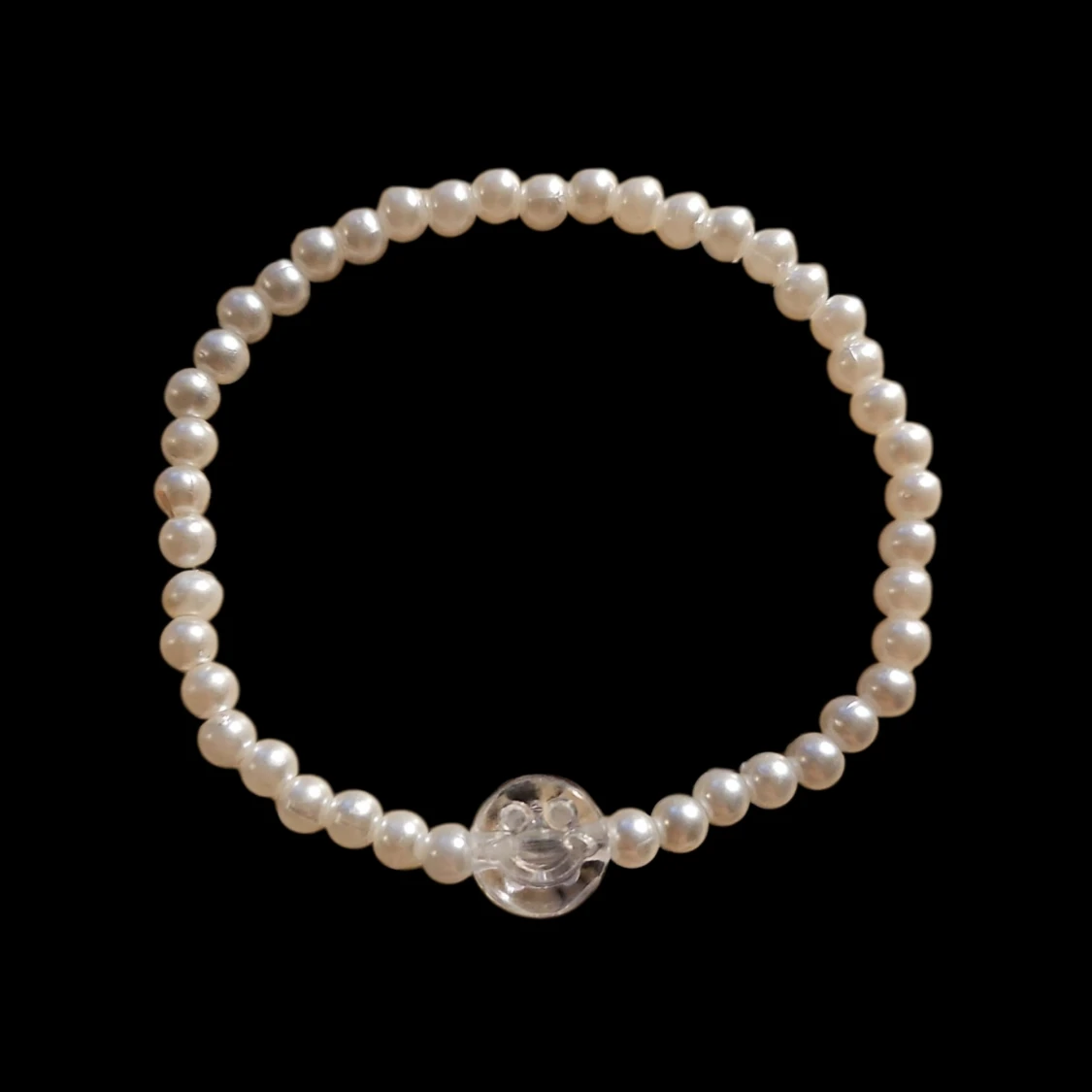 Pärlarmband med smiley detalj