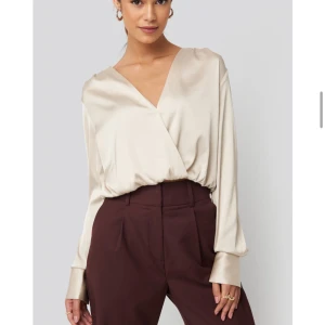 Blus satintopp - Från NAKD. Använd en gång, som ny!