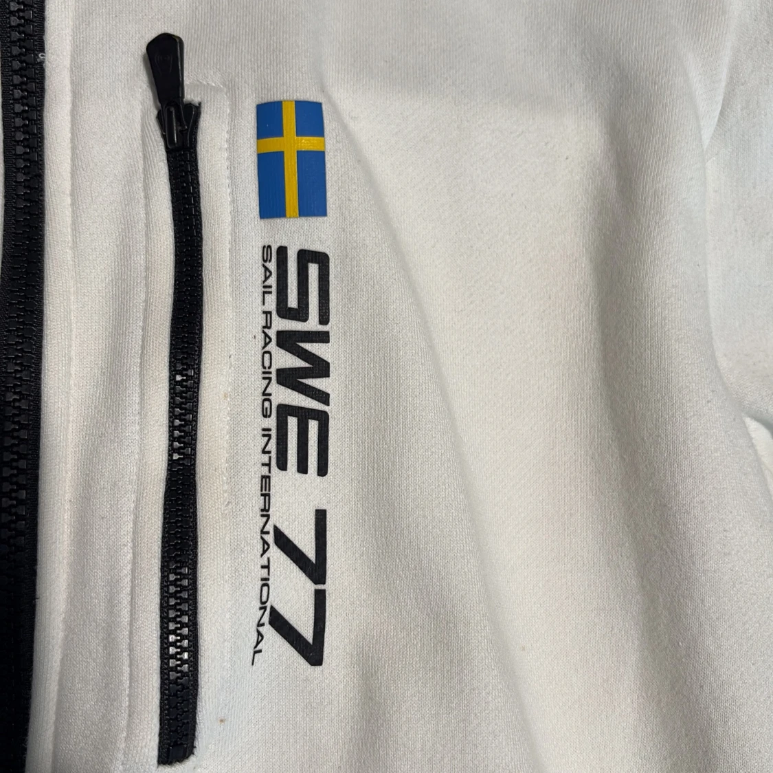 Vit hoodiejacka från Sail Racing International - 2
