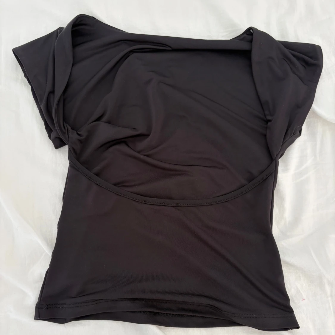 Svart backless top från Stradivarius XS - 1