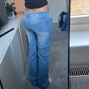 Bootcut jeans - Bootcut jeans midja 40 innerben 86