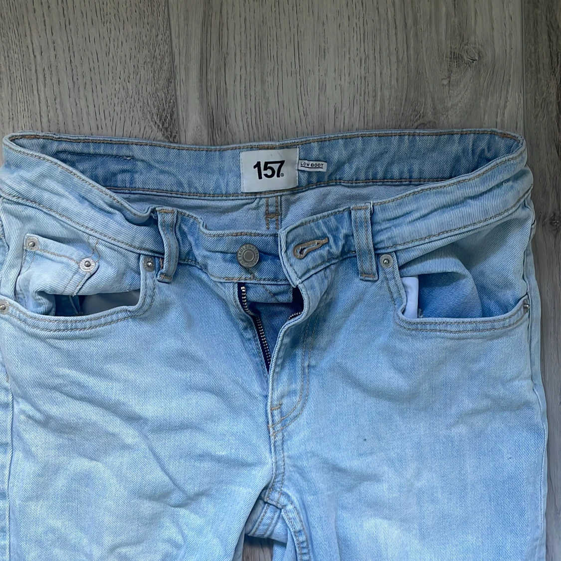 Bootcut ljusblå jeans från 157 - 1