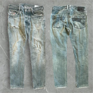 Mud washed diesel jeans  - Snygga diesel jeans, midjemått: 43 cm, ytterbenslängd: 100 cm, fotvidd: 17 cm. 