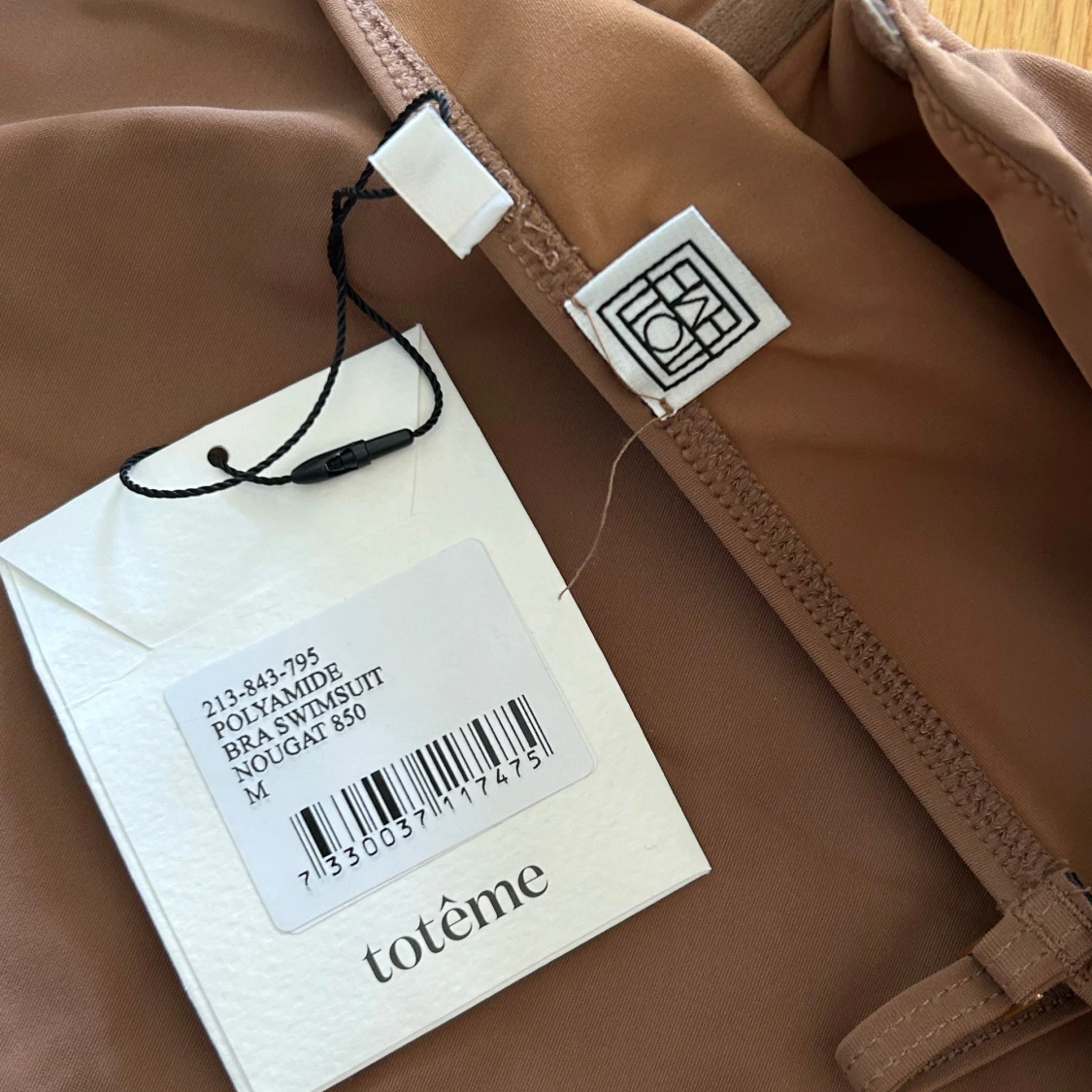 Brun baddräkt från Totême