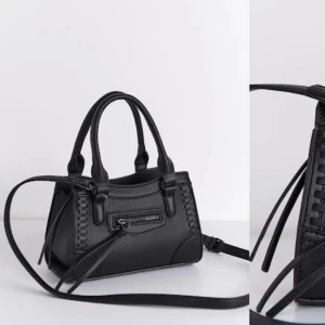 Svart handväska med dragkedja - Svart handväska med axelrem. Använd endast ett fåtal gånger, så den ser ut och vara helt ny. Väska från Ginatricot 