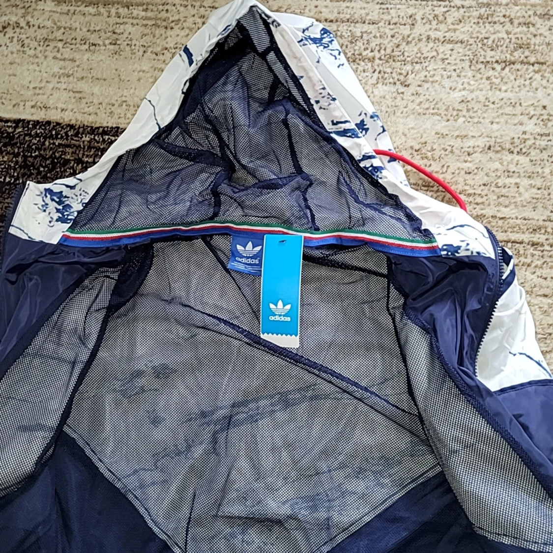 Blå och vit vindjacka från Adidas - 1