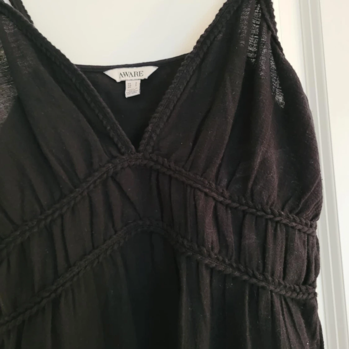 Svart linnetopp från Aware - 1