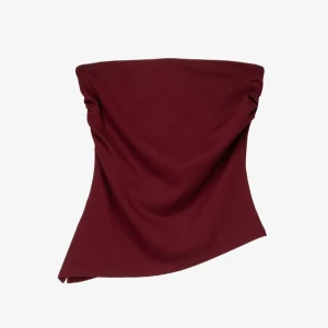 Vinröd tubtopp - Toppen är ärmlös och har en asymmetrisk design. 