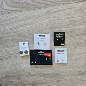 Öronhängen - 6 par helt oanvända öronhängen. 