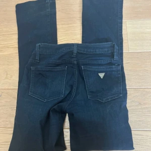 Guess jeans - Bootcut jeans från guess i storlek 23
