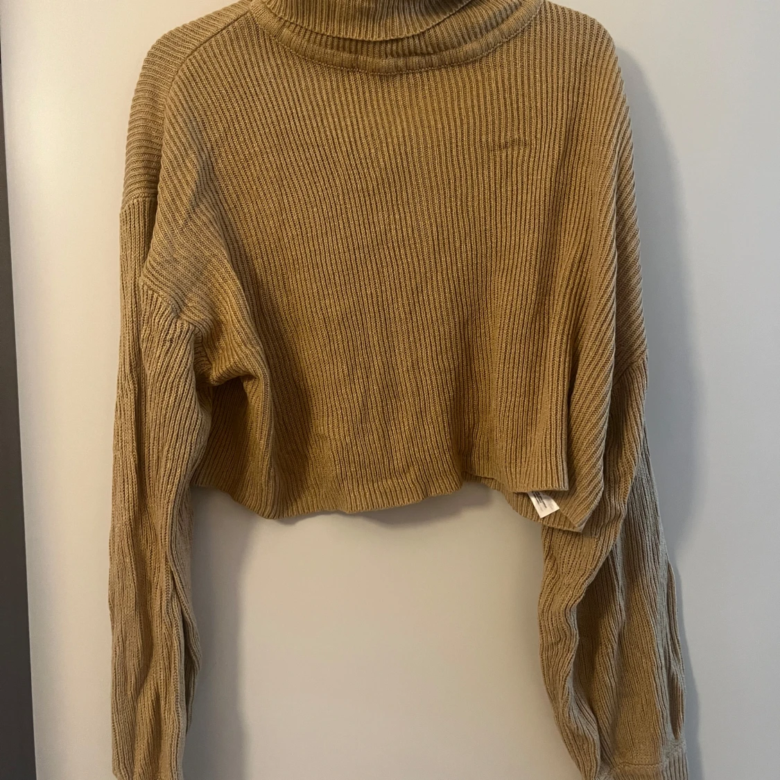 stickad croppad långärmad stl M