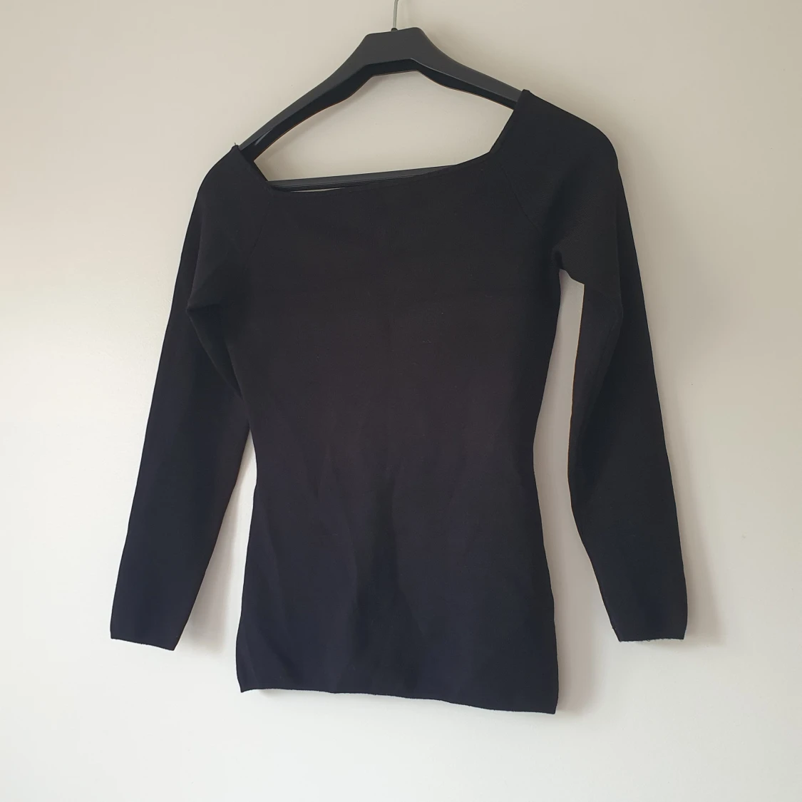 Svart långärmad ribbad topp från H&M strl M