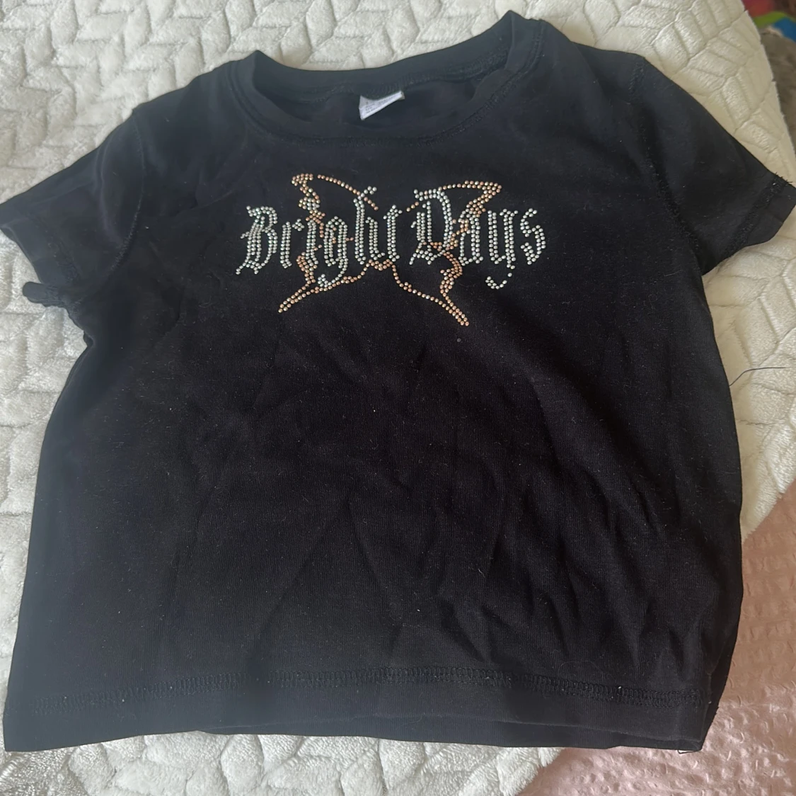 Svart topp med strass från Lindex