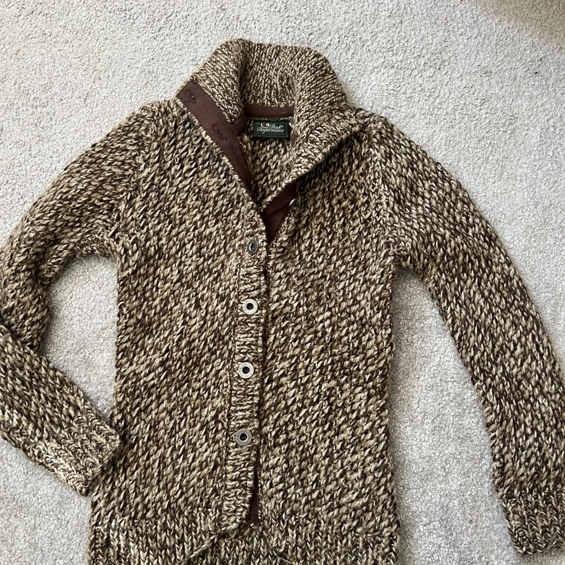 Stickad kofta från Peak Performance