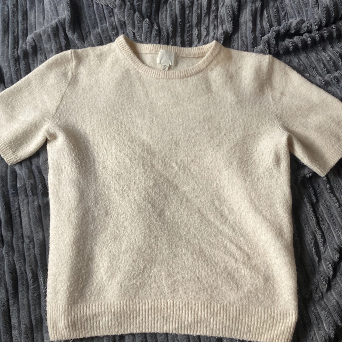 Beige stickad kortärmad tröja H&M
